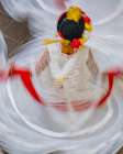 Mexico, San Miguel de Allende. Blurred motion view of woman dancing. Art Print